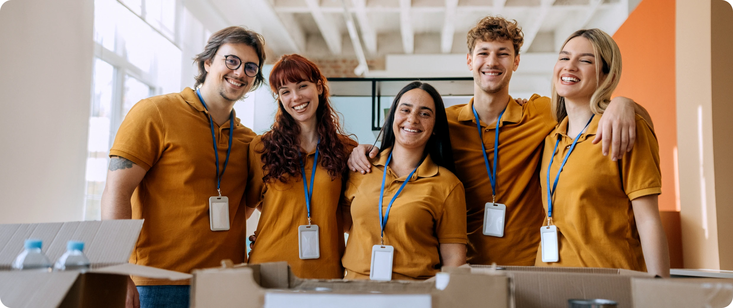 Group of volunteers smiling at camera